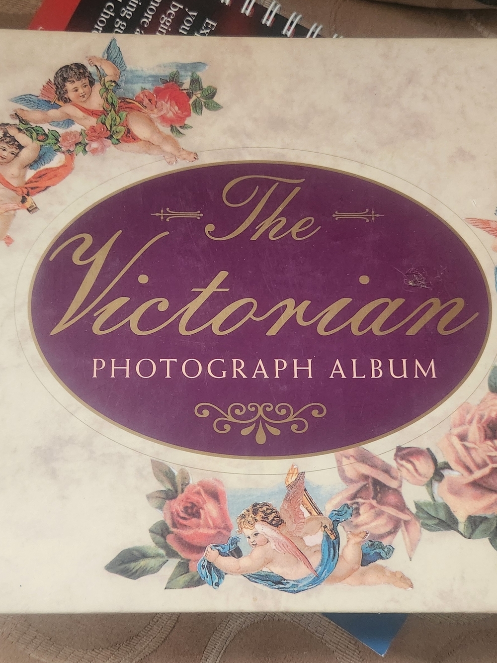 The Victorian Photograph Album - Purple Floral Cherub Cover